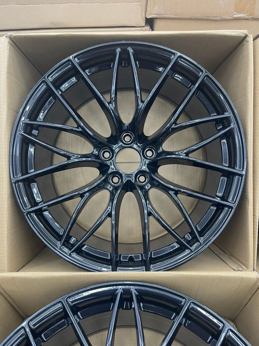 Set of four 20-inch 405M-style alloy wheels in gloss black for BMW G Series