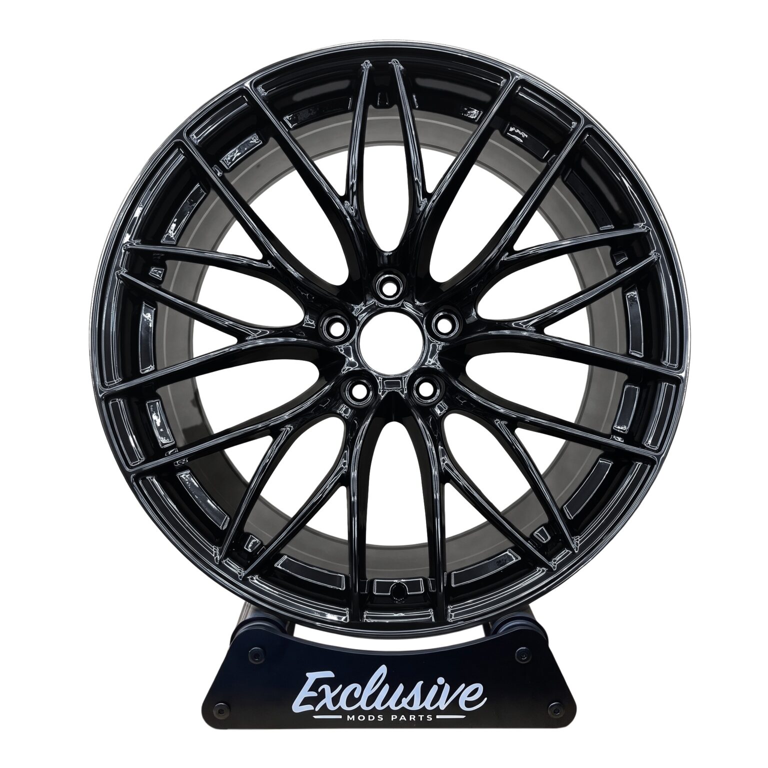 405M style alloy wheel in gloss black on the Exclusive Mods Parts display stand, front view