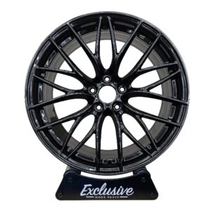 405M style alloy wheel in gloss black on the Exclusive Mods Parts display stand, front view
