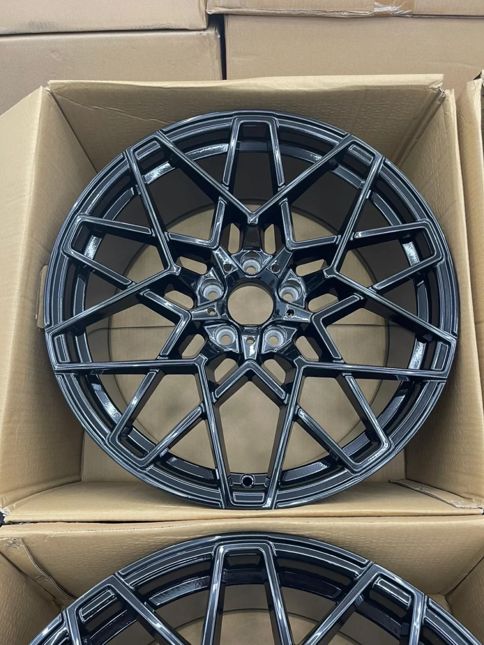 Set of four 20-inch 813M-style alloy wheels in gloss black for BMW G Series