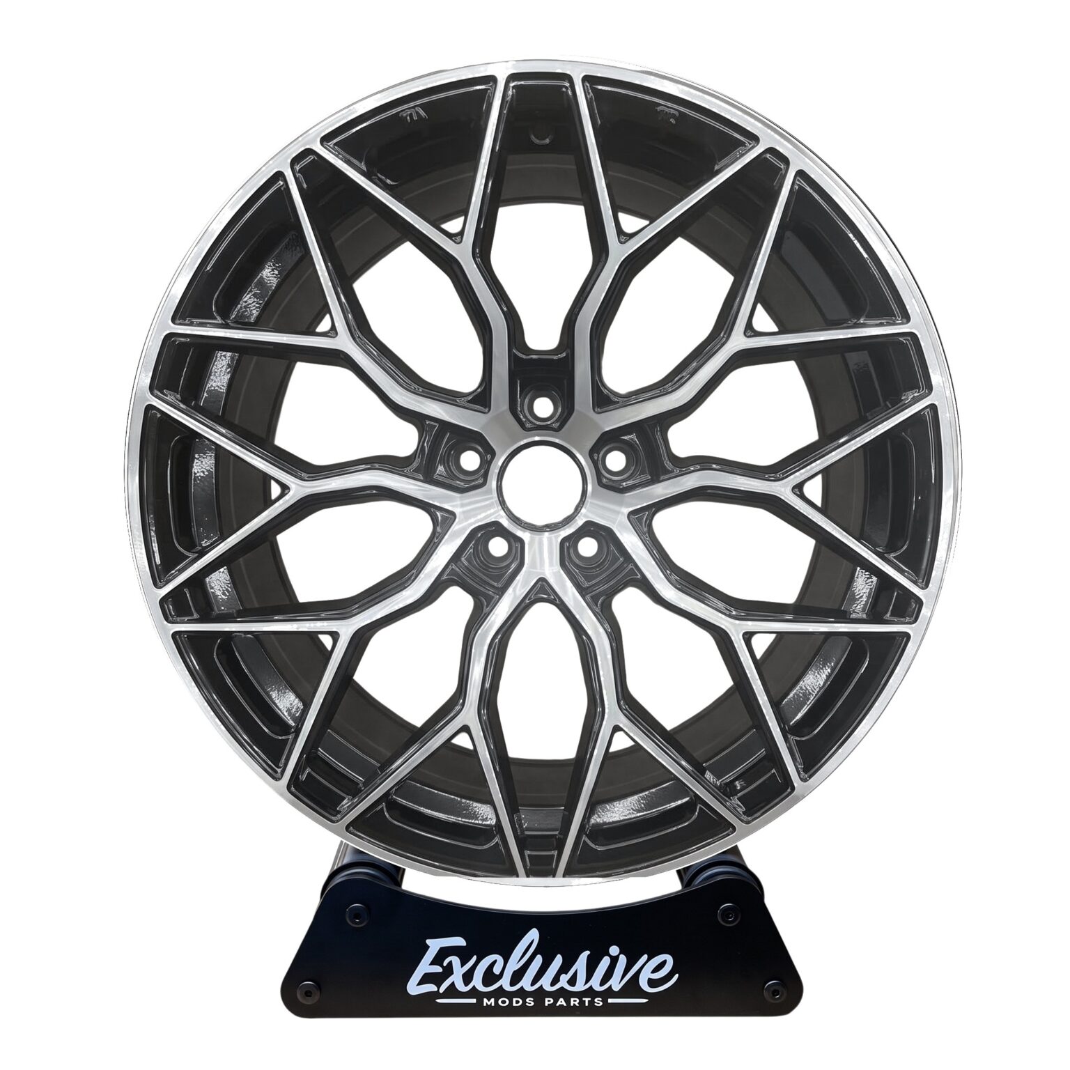 BMF style alloy wheel in gloss black with a diamond cut face on the Exclusive Mods Parts display stand, front view