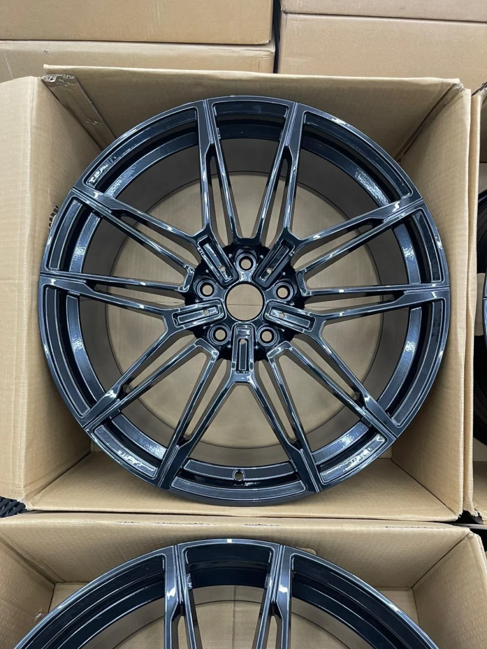 Set of four 20-inch 930M-style alloy wheels in gloss black for BMW