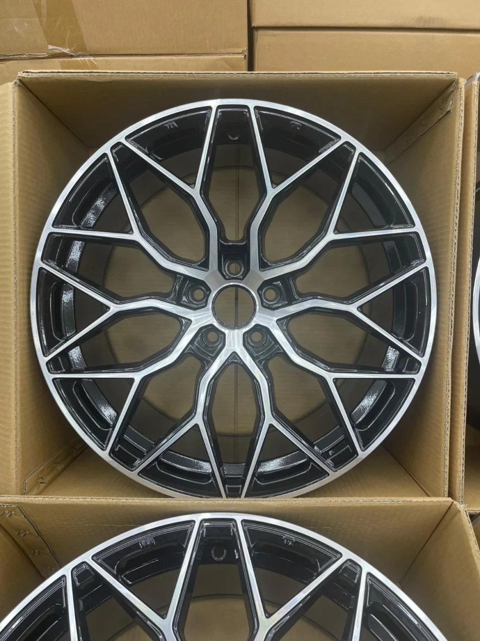 Set of four 19-inch Vossen-style alloy wheels in gloss black
