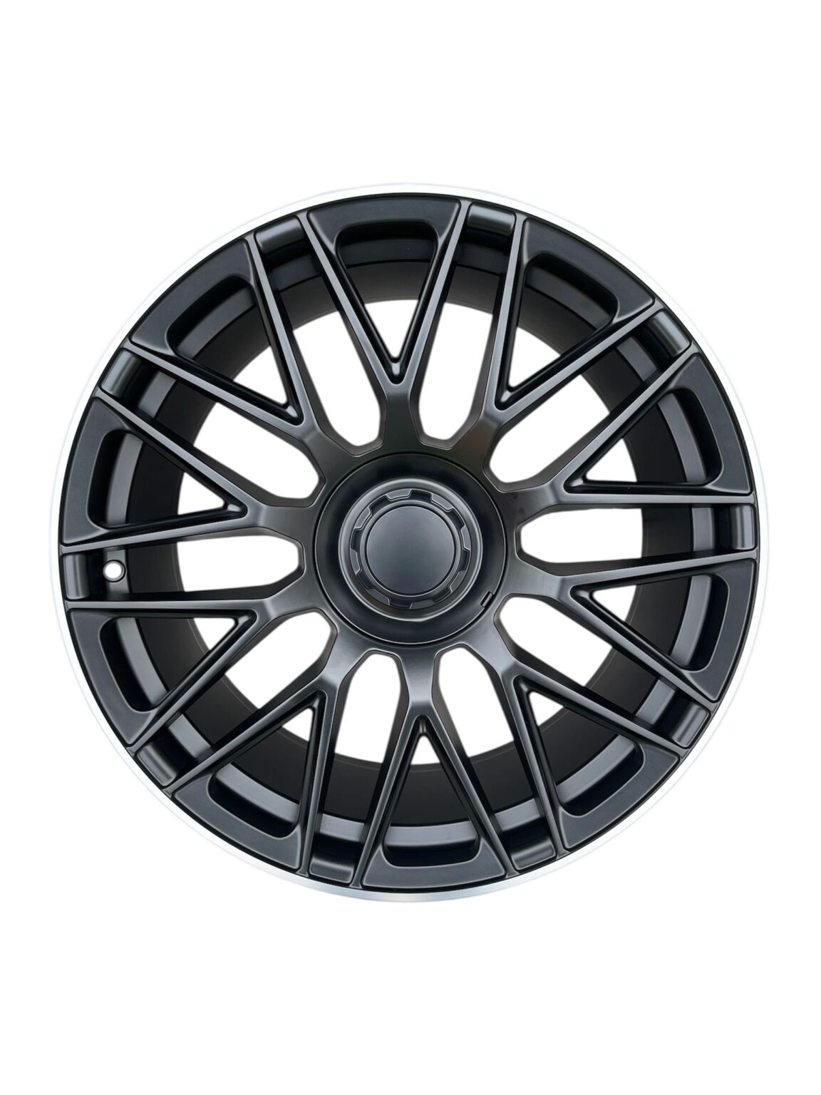 C63 AMG 10-Spoke Style alloy wheel in satin black with a machined silver lip, front view
