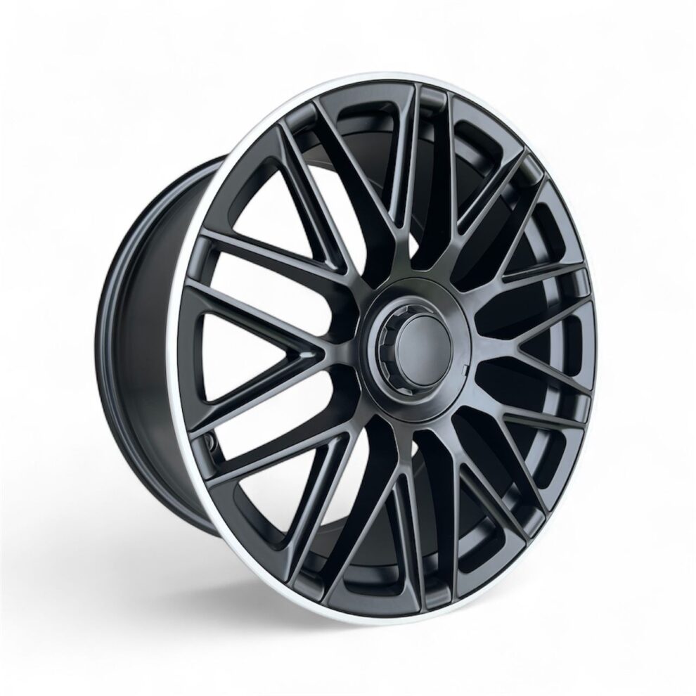 C63 AMG 10-Spoke Style alloy wheel in satin black with a machined silver lip, angled view