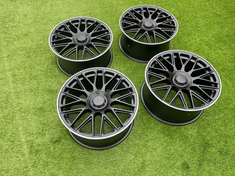 Set of four C63 AMG 10-Spoke Style satin black alloy wheels, angled view