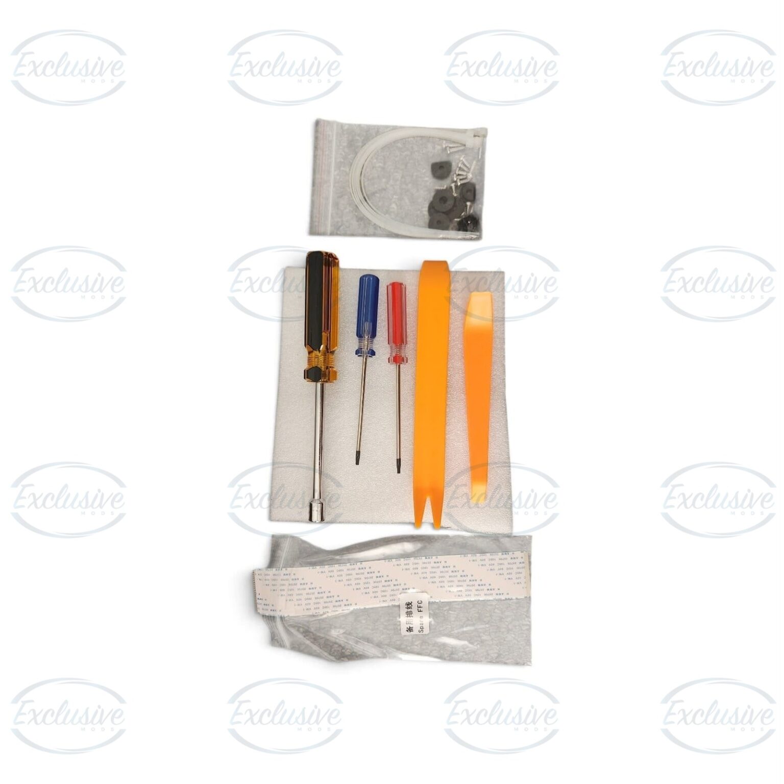 Trim removal tools, fixings and spare ribbon cable supplied with the cluster