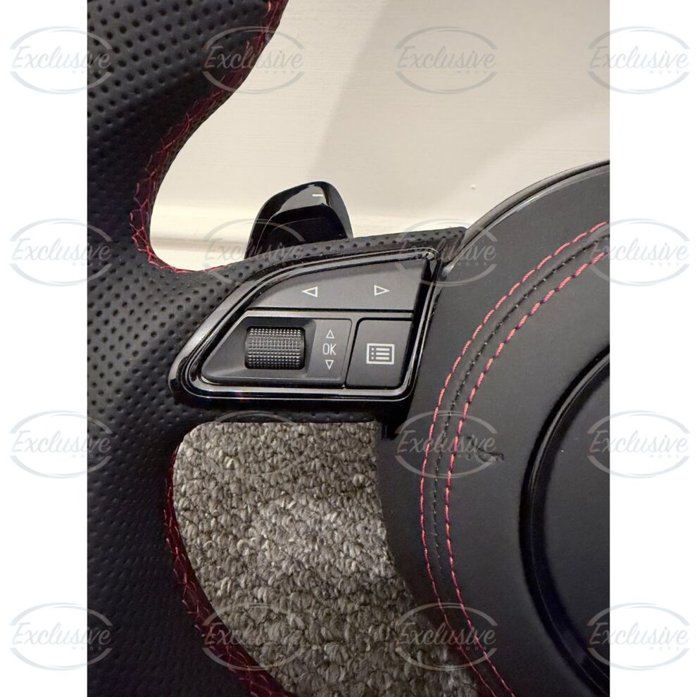 S-Line style flat bottom steering wheel with red stitching